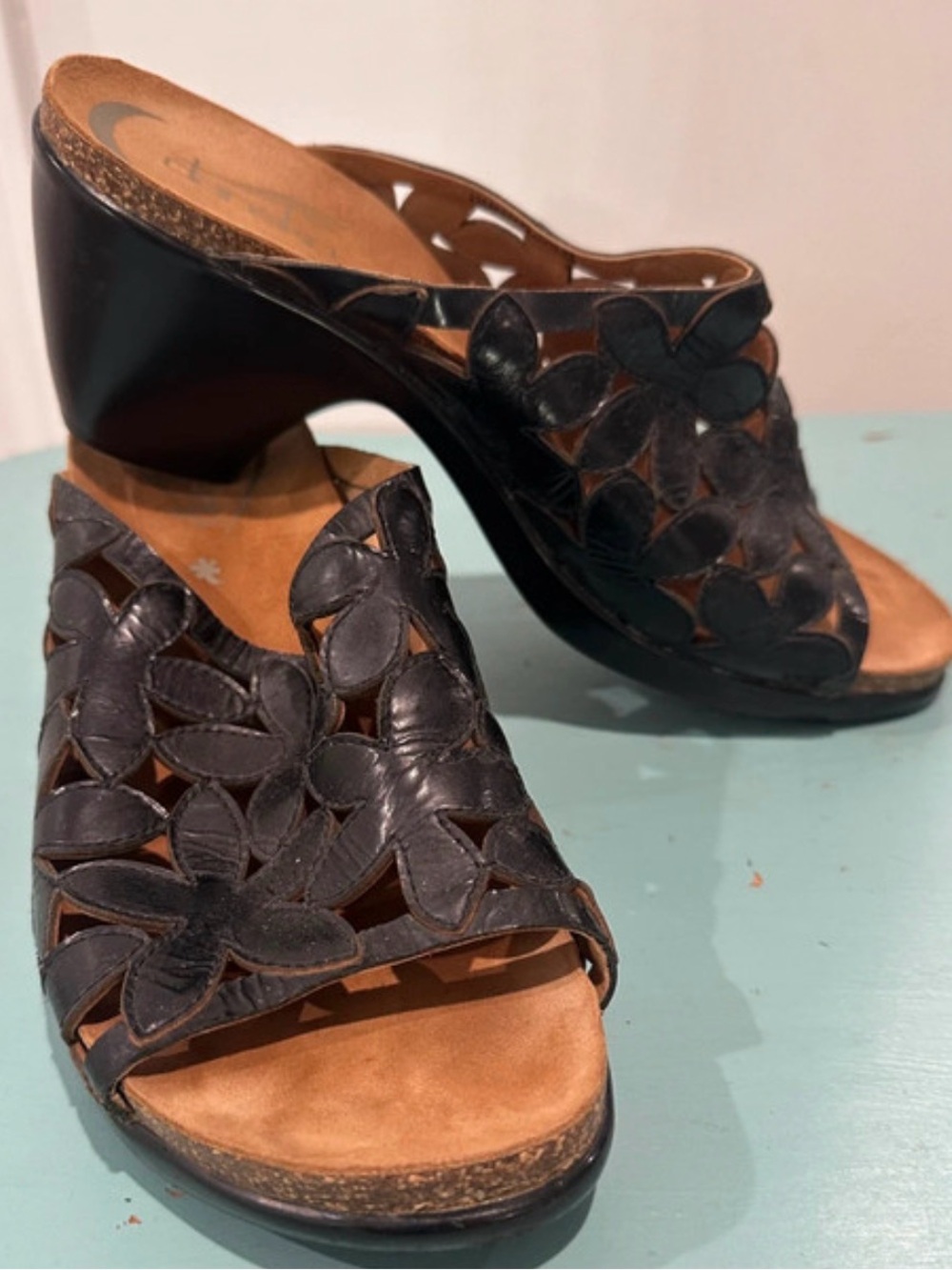 Dansko Black Floral Cutout Wedge Mules